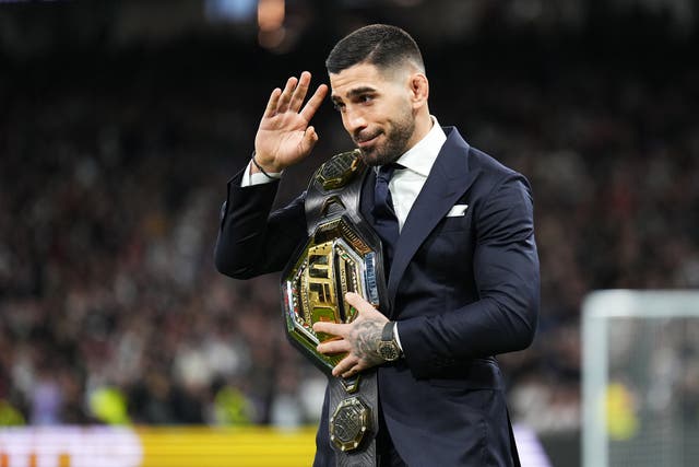 <p>Ilia Topuria parading his UFC title at Real Madrid’s stadium in 2024</p>
