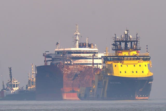 The tanker Stena Immaculate is towed into the Port of Great Yarmouth (Yui Mok/PA)