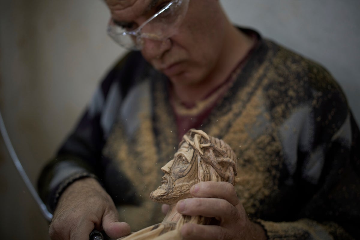 PHOTO ESSAY: Workshops empty, Bethlehem carvers fret over second Easter with no tourists
