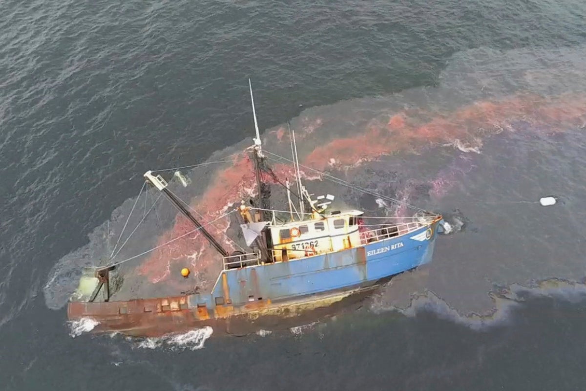 3 rescued and fuel spilled from fishing boat stuck in Boston Harbor
