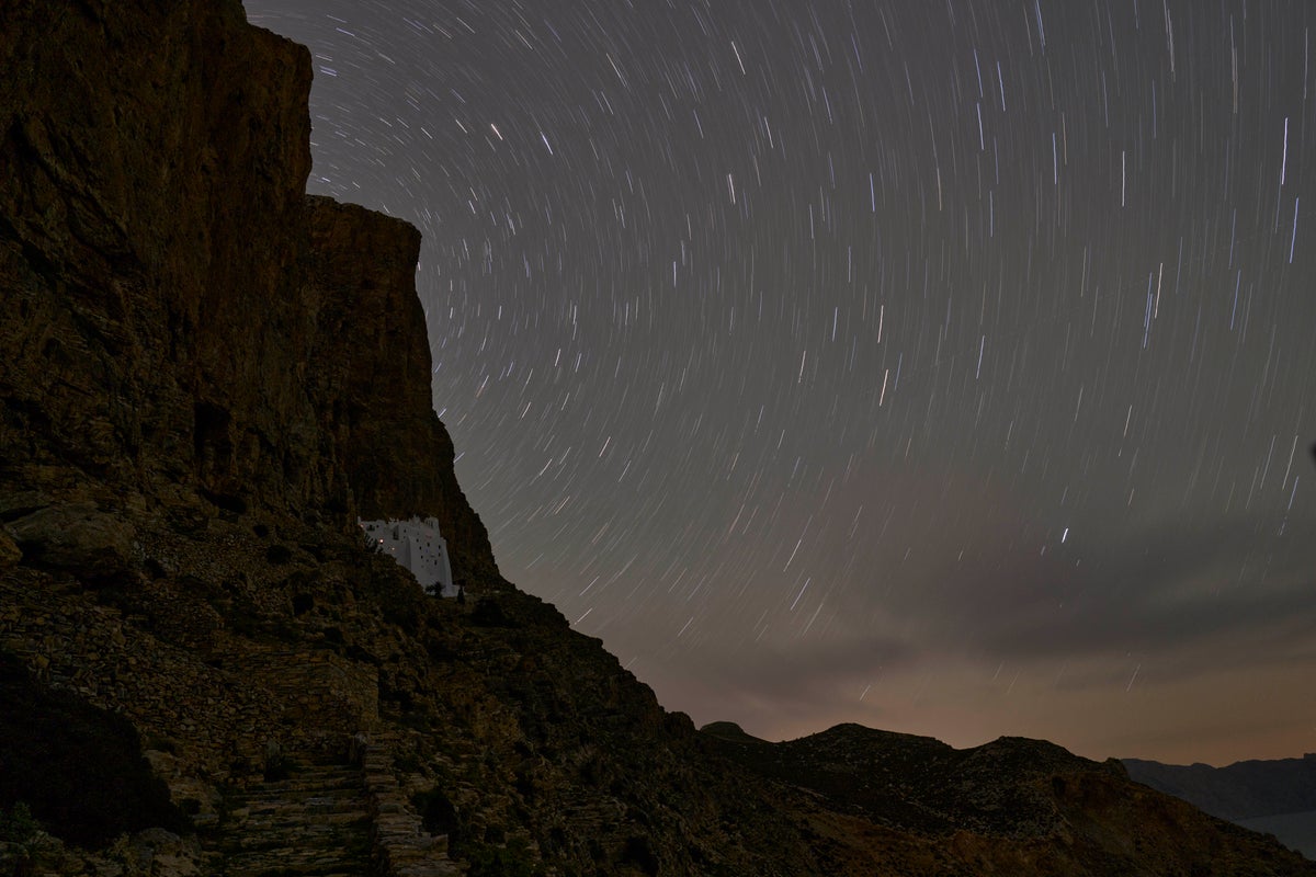 Photo Gallery: From Greek monastery on island cliffside, prayer lift up wonders of the night sky
