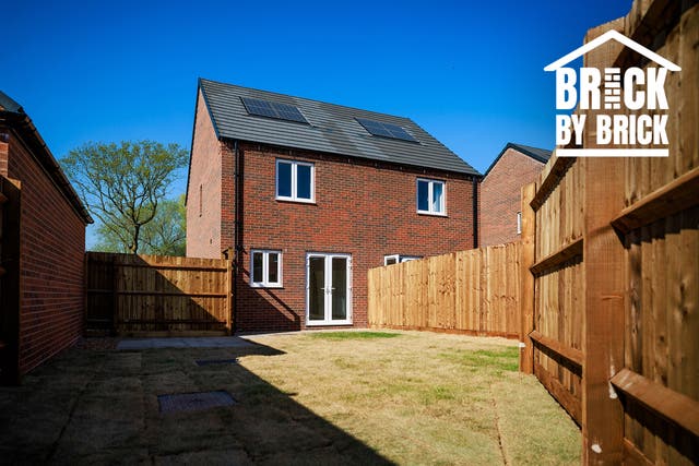 <p>A safe haven built by The Independent’s Brick by Brick campaign is now home to a family fleeing domestic abuse</p>