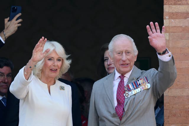 King Charles III and Queen Camilla wave from a balcony during a visit to a UK-Emilia Romagna Food Festival at Piazza del Popolo, in the heart of Ravenna, on the last day of the four day state visit to Italy (PA)