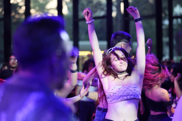 <p>A woman dances at the Chapultepec Scenic Garden during a cost-free, harassment-free, judgment-free event by the New Network of Dancers collective or NRB, in Mexico City, Sunday, March 16, 2025. (AP Photo/Ginnette Riquelme)</p>