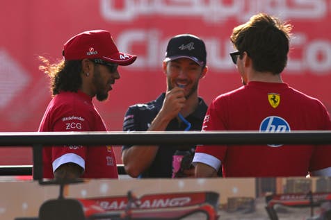 <p>Lewis Hamilton of Great Britain and Scuderia Ferrari Pierre Gasly of France and Alpine F1 and Charles Leclerc of Monaco and Scuderia Ferrari on the drivers parade prior to the F1 Grand Prix of Bahrain at Bahrain International Circuit </p>