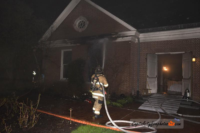 <p>Firefighters extinguish flames at Pennsylvania Governor Josh Shapiro's residence after an arsonist set fire to the building</p>