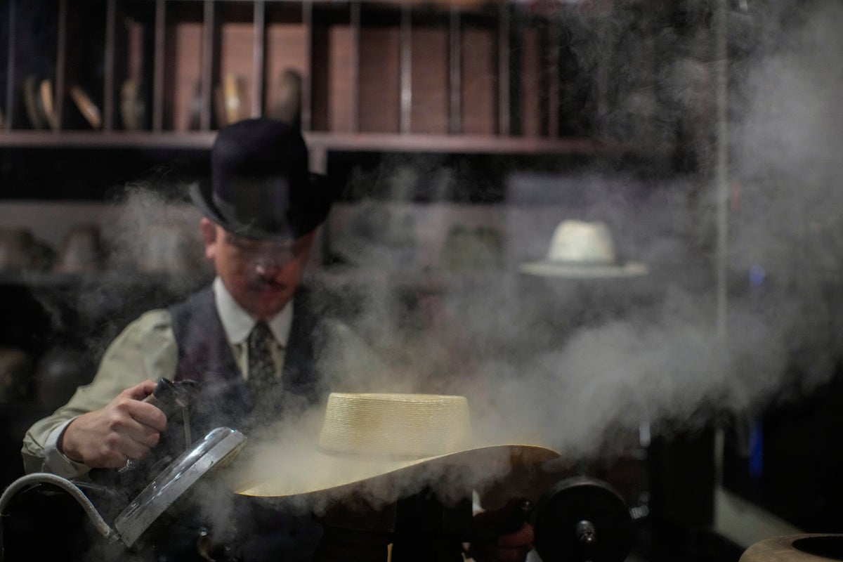 AP PHOTOS: Chile's capital has the the oldest hat maker in South America