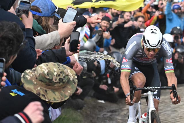<p>Dutch Alpecin-Deceuninck rider Van der Poel also had drink thrown at him</p>