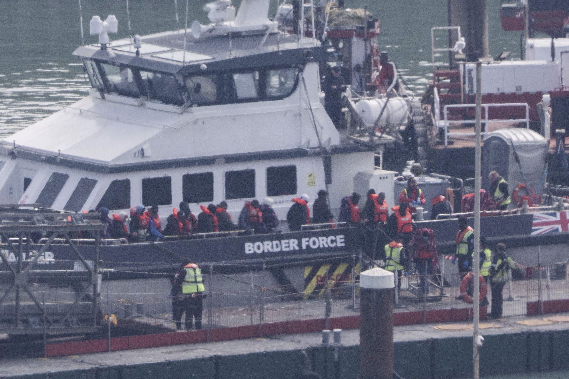 A group of people thought to be migrants are brought in to Dover, Kent, from a Border Force vessel on Monday (Gareth Fuller/PA)
