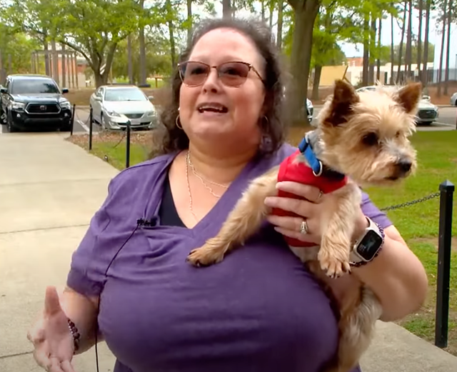 <p>Debbie LaFleur and her dog, Kingston, moments after they were reunited by members of the Kappa Sigma fraternity on the University of Southern Mississippi campus in Hattiesburg. Kingston disappeared five years ago in the aftermath of Hurricane Laura, and traveled approximately 300 miles from his home in Lake Charles to reach the campus</p>