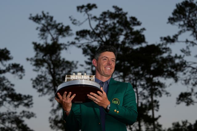 Rory McIlroy holds the Masters trophy following his dramatic victory at Augusta National (David J. Phillip/AP)
