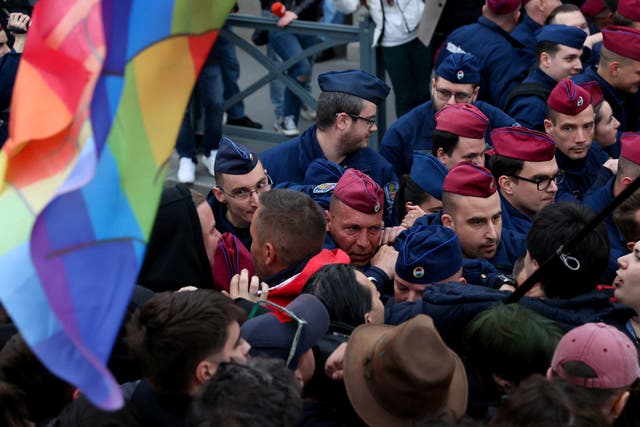 <p>Police block protesters in Budapest after Hungary’s parliament voted on constitutional amendments targeting the LGBT+ community</p>