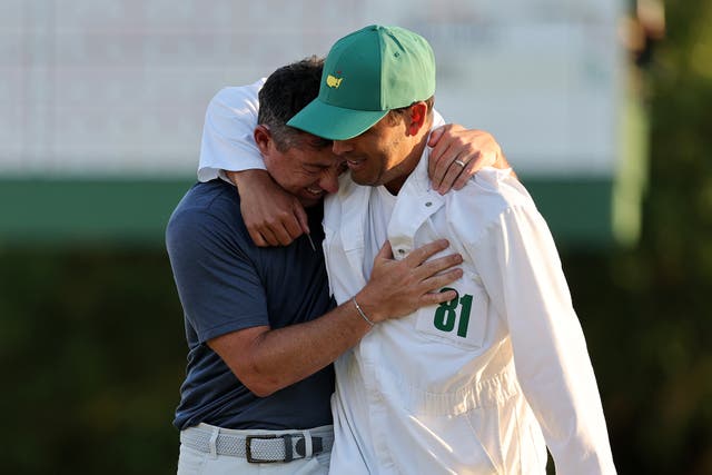 <p>Rory McIlroy (left) praised caddie Harry Diamond for his efforts in helping the Northern Irishman finally win the Masters</p>