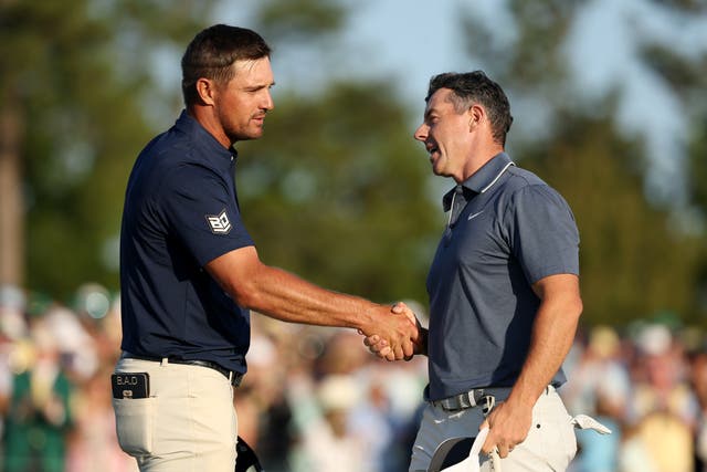<p>Bryson DeChambeau (left) and Rory McIlroy played the final round of the 2025 Masters together with McIlroy finally winning the tournament</p>