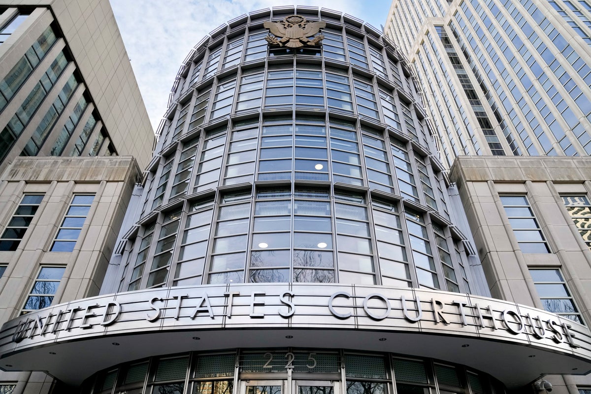 Scholar spared prison in US case alleging China spies on dissidents abroad