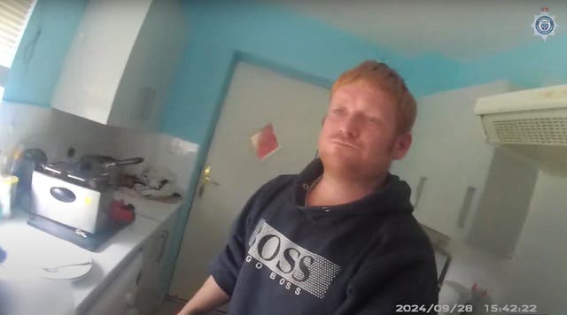 <p>Image taken from the body-worn video footage of police officers speaking to Matthew Higgins</p>