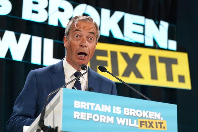 Reform UK leader Nigel Farage speaking at the Newton Aycliffe working men’s club in Durham while on the local election campaign trail (Owen Humphreys/PA)