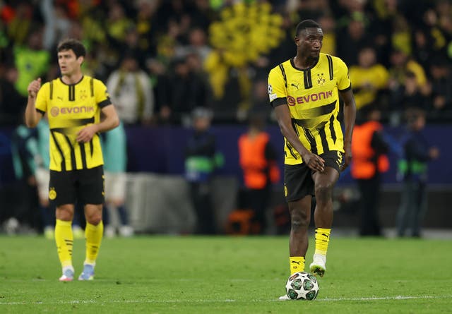 <p>Serhou Guirassy scored a hat-trick for Dortmund but it was not enough</p>