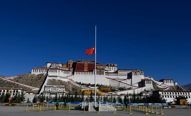 <p>File. The Chinese flag flies at a plaza near the Potala Palace in Lhasa, Tibet</p>