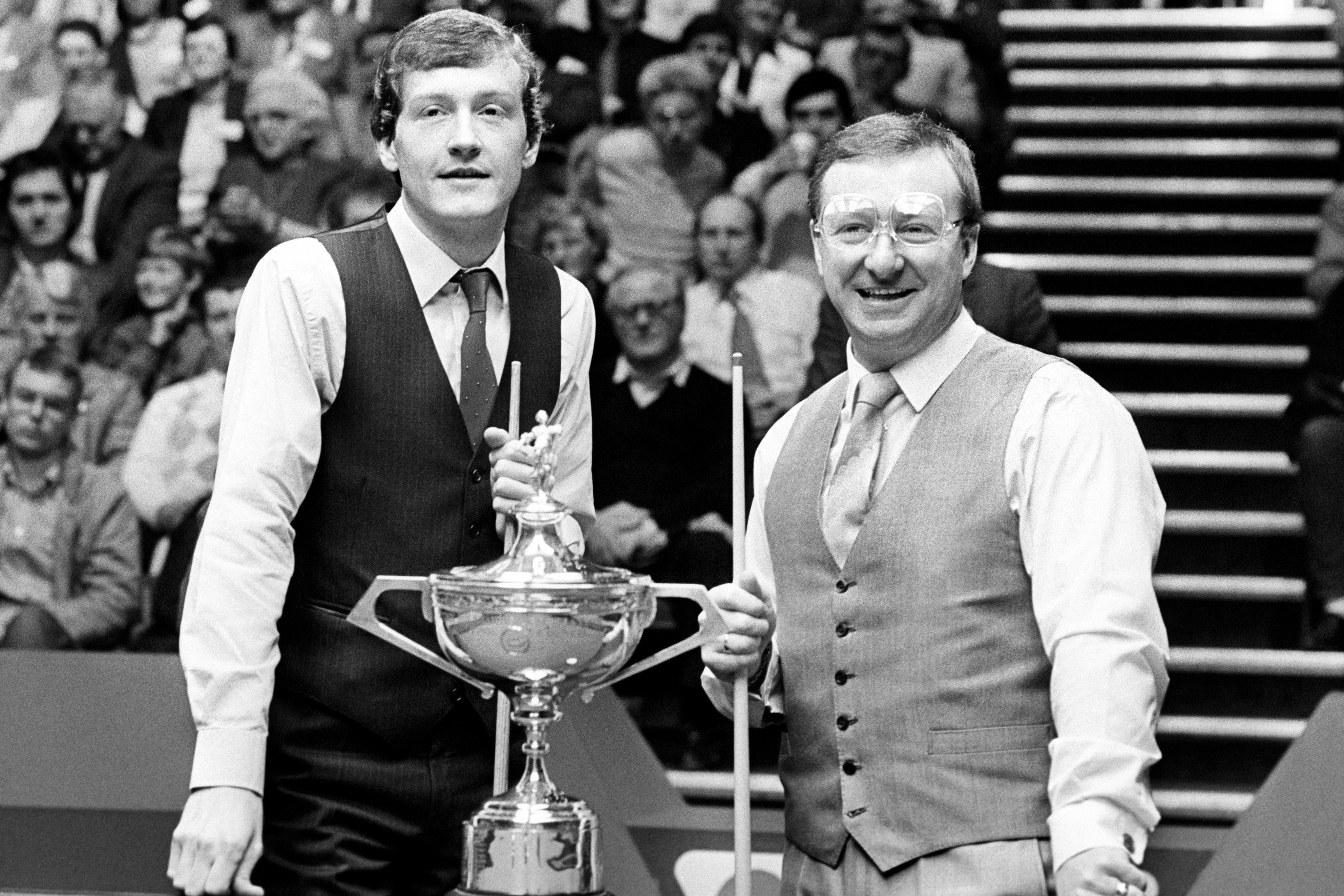 Steve Davis and Dennis Taylor at the 1985 World Snooker Championship final (PA Archive)