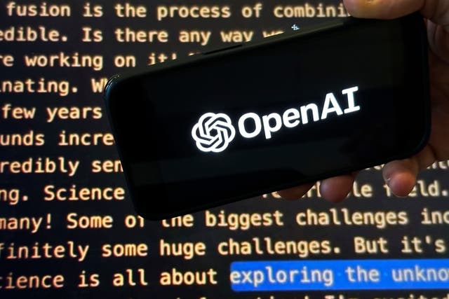 The OpenAI logo on a mobile phone (Peter Morgan/AP)