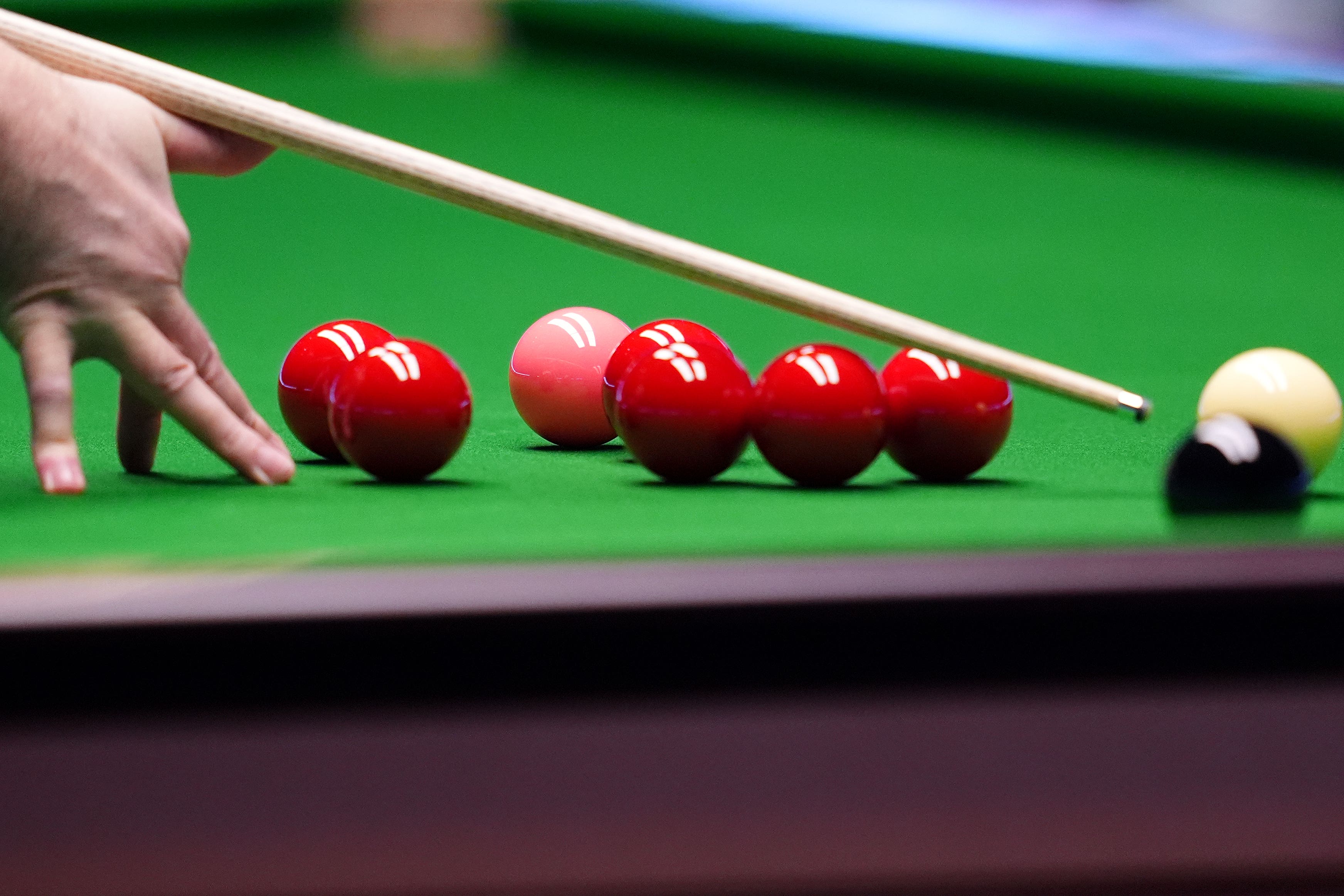 Graeme Dott, 47, is accused of two charges relating to children (PA)