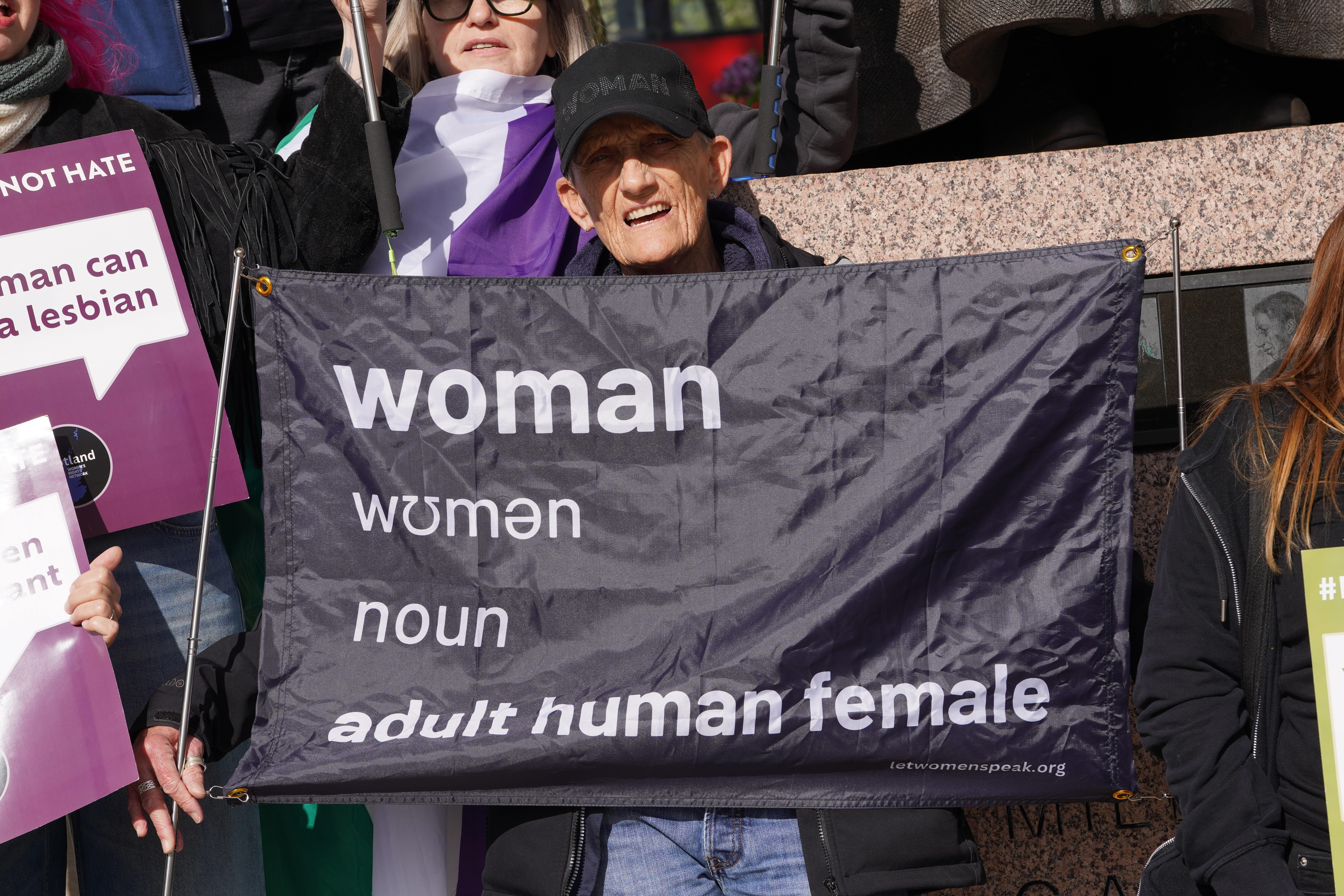 Campaigners celebrate outside the Supreme Court in London (Lucy North/PA)