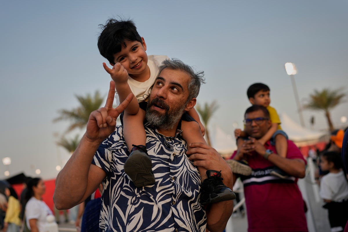 AP PHOTOS: Formula One fans flock to Bahrain for the first race of the season in Mideast