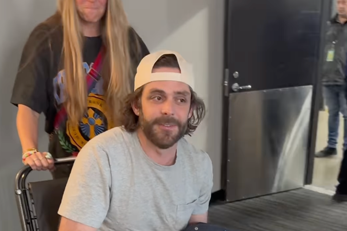 Country star Thomas Rhett leaves concert in a wheelchair after being ...