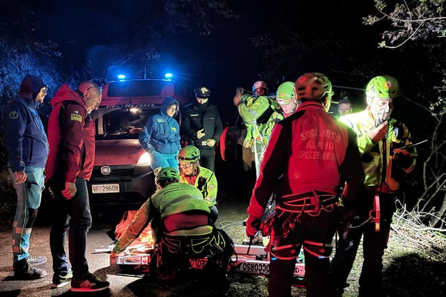 Rescuers on the site where a cable car south of Naples has crashed after the cable snapped (Alessandro Garofalo/LaPresse via AP)