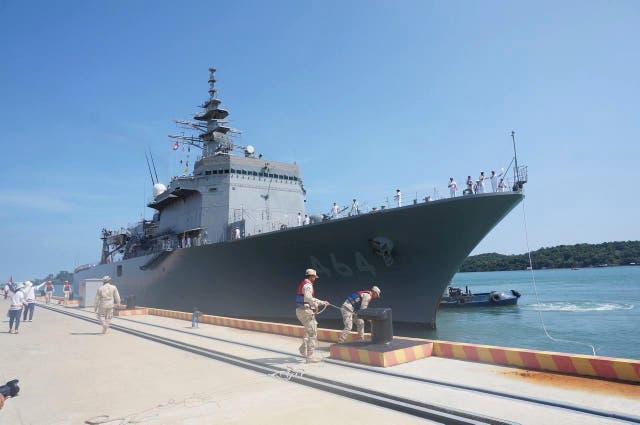 <p>A Japanese warship docks at a naval base's pier during a four-day visit at the Ream Naval Base, Cambodia, Saturday, 19 April 2025</p>