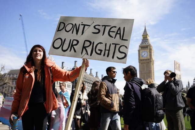 Campaigners take part in a rally at Parliament Square, central London, following the Supreme Court ruling on definition of a woman in equalities law (Andrew Matthews/PA)
