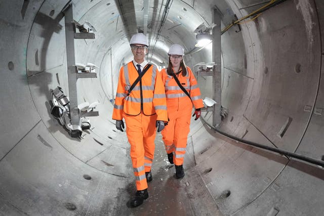 Ed Miliband, left, said Nigel Farage was peddling ‘nonsense and lies’ about net zero (Stefan Rousseau/PA)