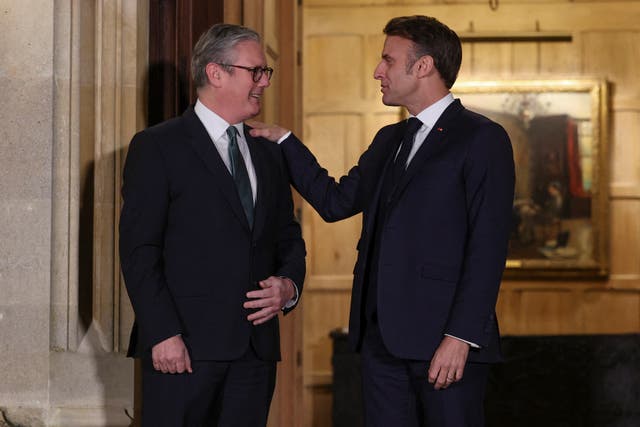 Emmanuel Macron will reportedly make a state visit before Donald Trump (PA)