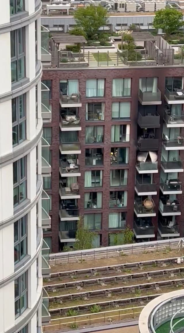 Aldgate fire: 100 firefighters tackle huge blaze at block of London ...