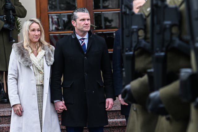 <p>The US Secretary of Defense, Pete Hegseth and his wife Jennifer Rauchet watch a military honour parade at the Ministry of Defense on February 14, 2025 in Warsaw, Poland. The Trump Administration's recently appointed defense secretary met Polish leaders to discuss bilateral defense cooperation, deterrence efforts on NATO's eastern flank, and defense investment and burden-sharing in NATO</p>