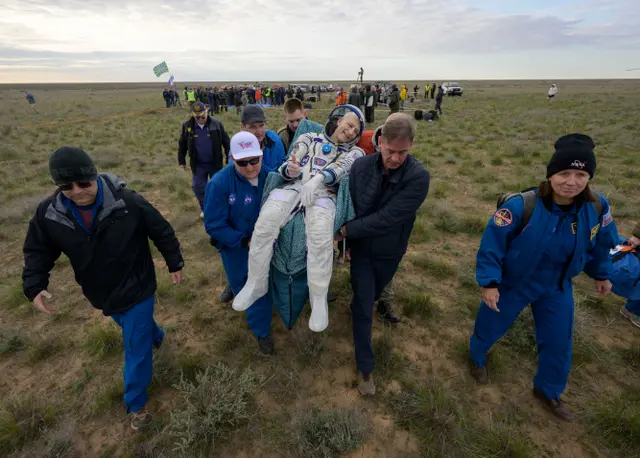 <p>Nasa astronaut Don Pettit is carried to a medical tent shortly after return to Earth</p>