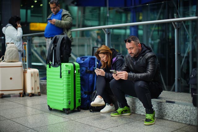 <p>Passengers who suffer flight disruption are often left unsure what they are entitled to (James Manning/PA)</p>