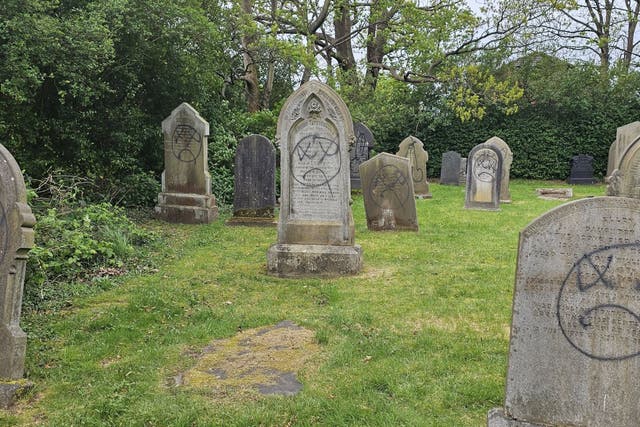 NOTE: USE OF OBSCENE GRAFFITI AND PROFANITY Handout photo courtesy of Councillor Paul Wharton-Hardman of lewd images and offensive phrases daubed on the walls of St James Church in Leyland, near Preston (Paul Wharton-Hardman/PA)