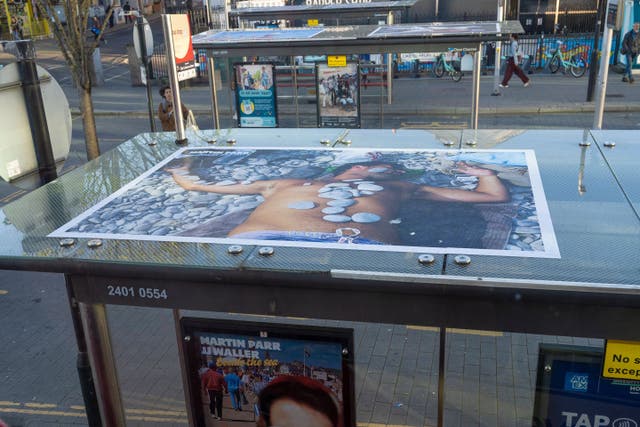 The photographs can only been seen from the top deck of a bus (JJ Waller/PA)