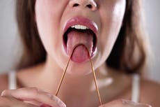 Tongue scraping and oil pulling: Does balancing your oral microbiome hold the key to better health?