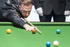Judd Trump on top while Ronnie O’Sullivan grinds out lead at Crucible