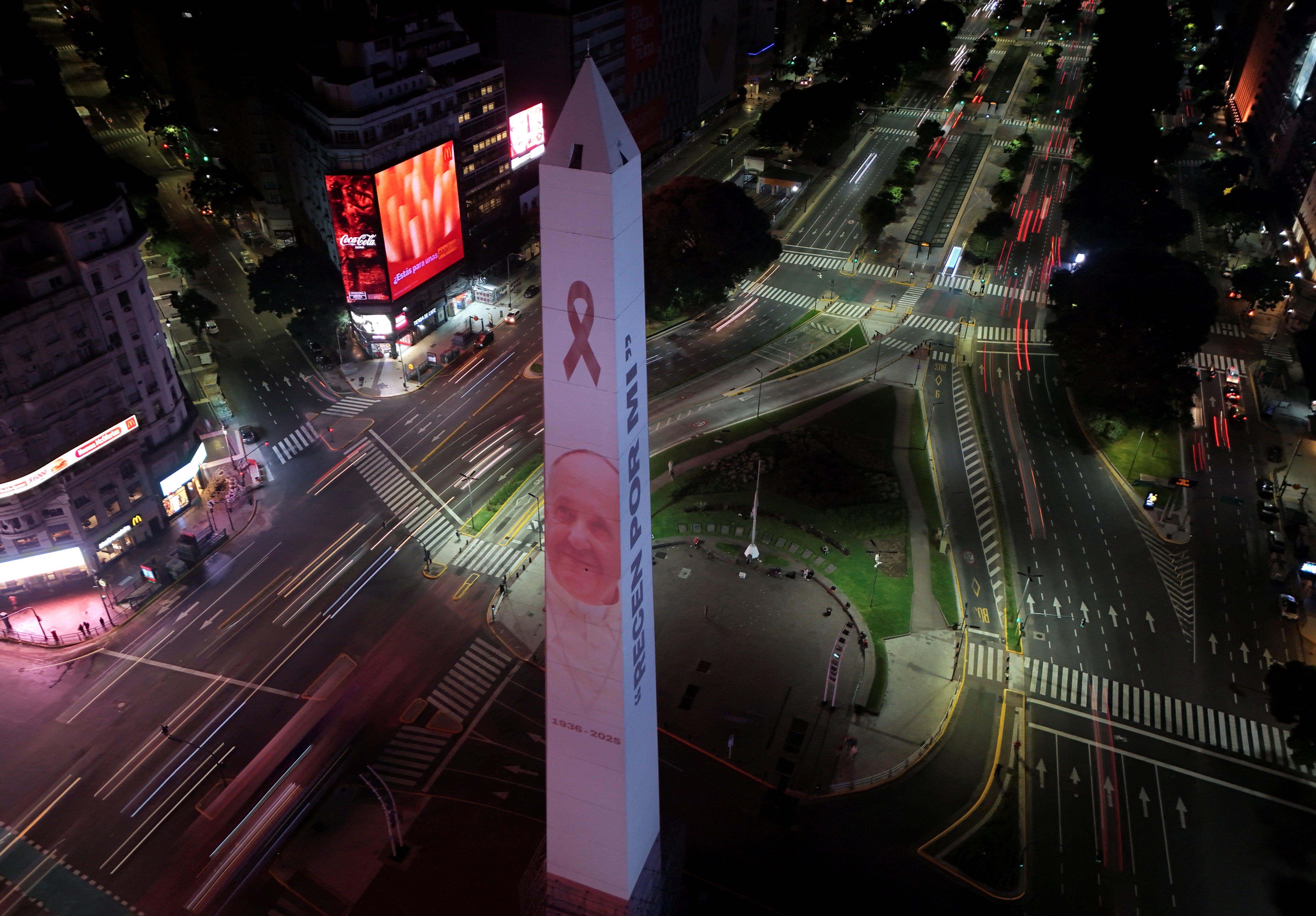 A drone view shows the projection of Pope Francis' portrait on the Obelisk, following the death of the pontiff, in Buenos Aires, Argentina