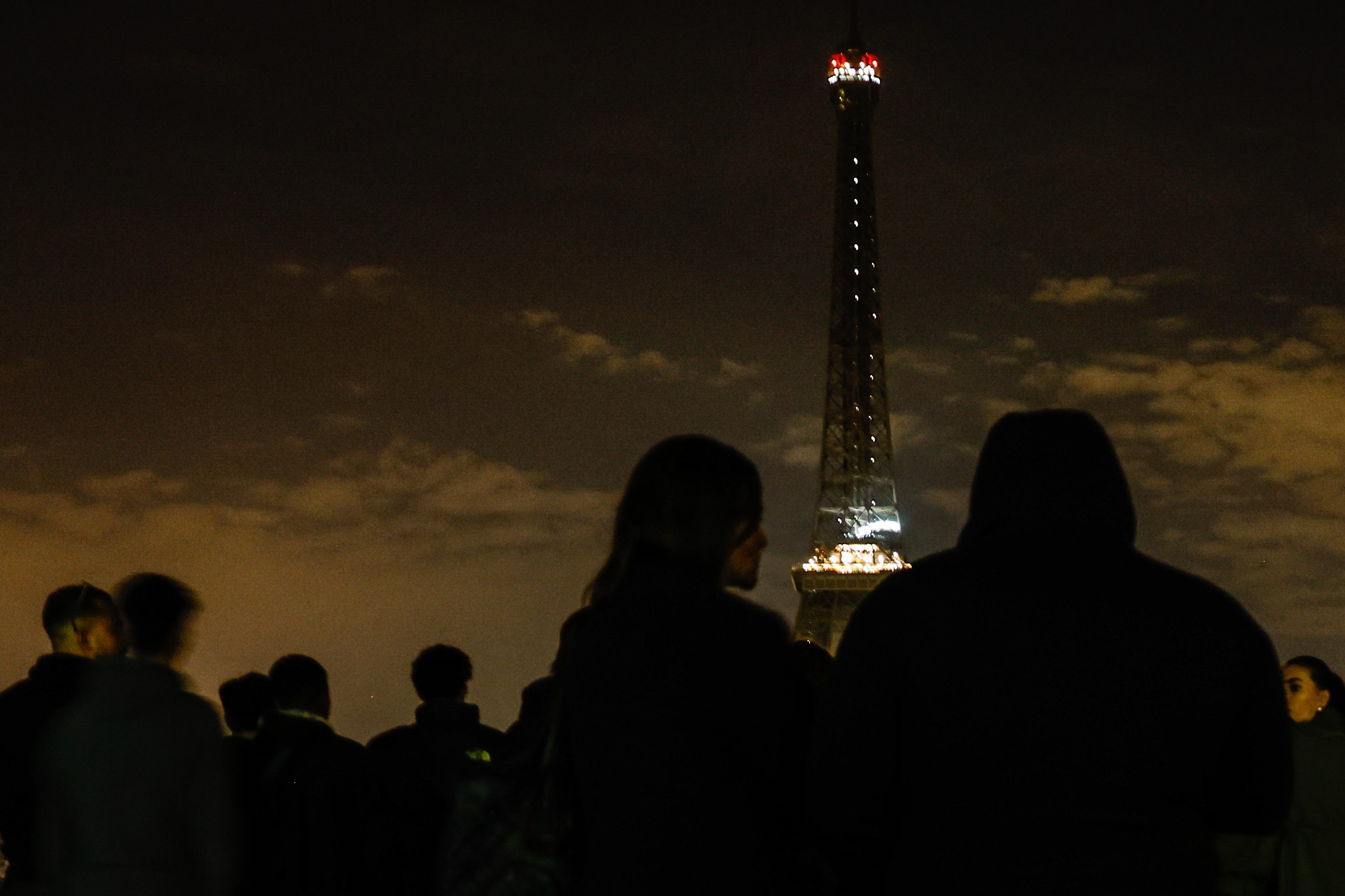 The Eiffel Tower switches off its lights to pay tribute to late Pope Francis in Paris, France