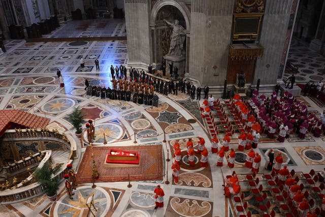 <p>Cardinals pay their respects to Pope Francis inside St. Peter's Basilica</p>