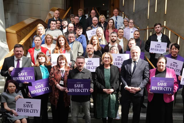 Actor Stephen Purdon (front in grey top) led the River City cast and crew to Holyrood (Andrew Milligan/PA)