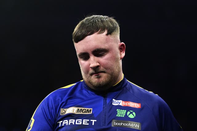 Luke Littler was beaten 6-5 by Michael van Gerwen in Liverpool (Peter Byrne/PA)