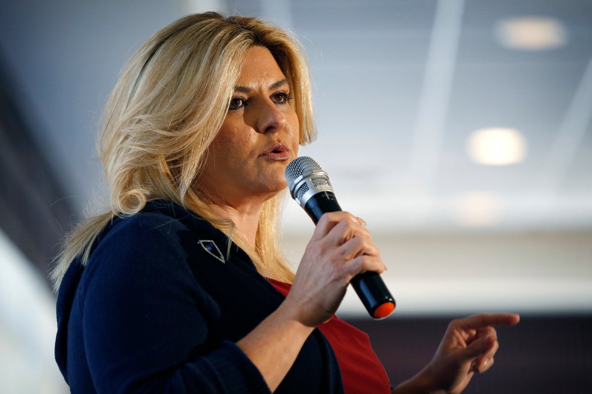Trump pardons Nevada politician who paid for her plastic surgery with funds to honor a slain officer