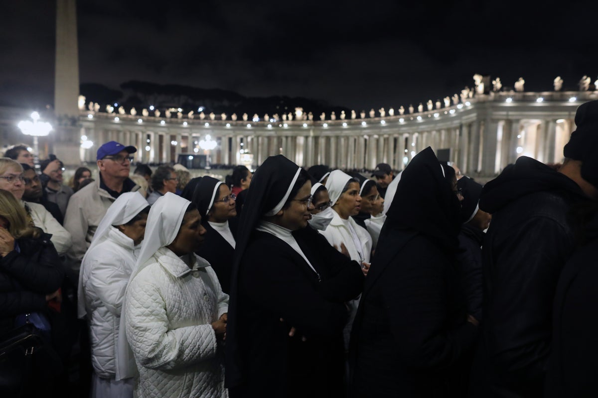 Pope Francis latest: Outrage over mourners taking selfies with casket as thousands pay respects at the Vatican