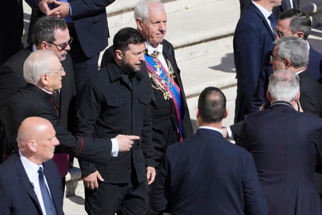 <p>Volodymr Zelensky, centre, arriving for the funeral of Pope Francis in St Peter’s Square (AP Photo/Markus Schreiber)</p>